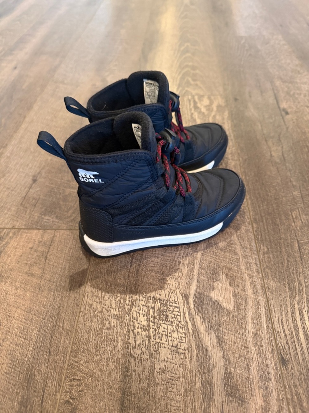 Sorel Kids Black Boots with Red Lace Accents